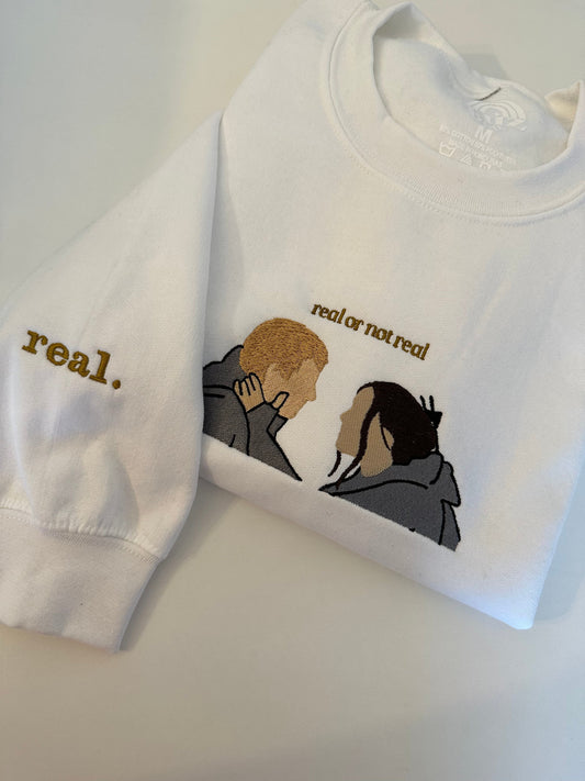 real or not real embroidered sweatshirt